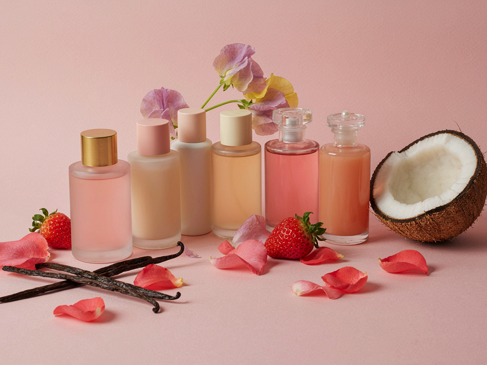 Pastel fragrance bottles with rose, strawberry, coconut and vanilla